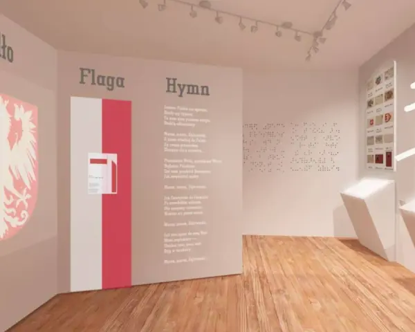 Wystawa o symbolach narodowych, gdzie znajduje się muzeum hymnu narodowego. Widzimy godło, flagę i tekst pieśni.